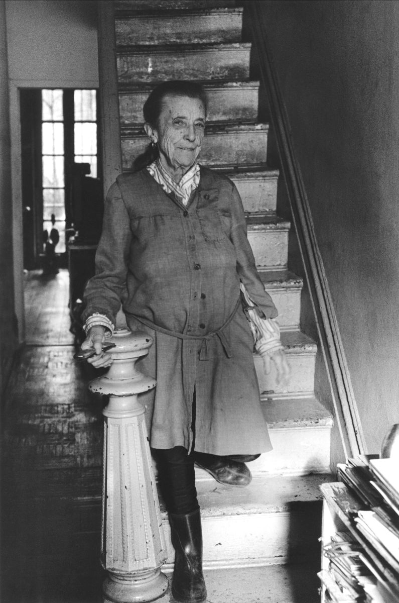 Credit: Louise Bourgeois descending the stairs in her home on West 20th Street in NYC in 1992. © The Easton Foundation, Photo: Claire Bourgeois